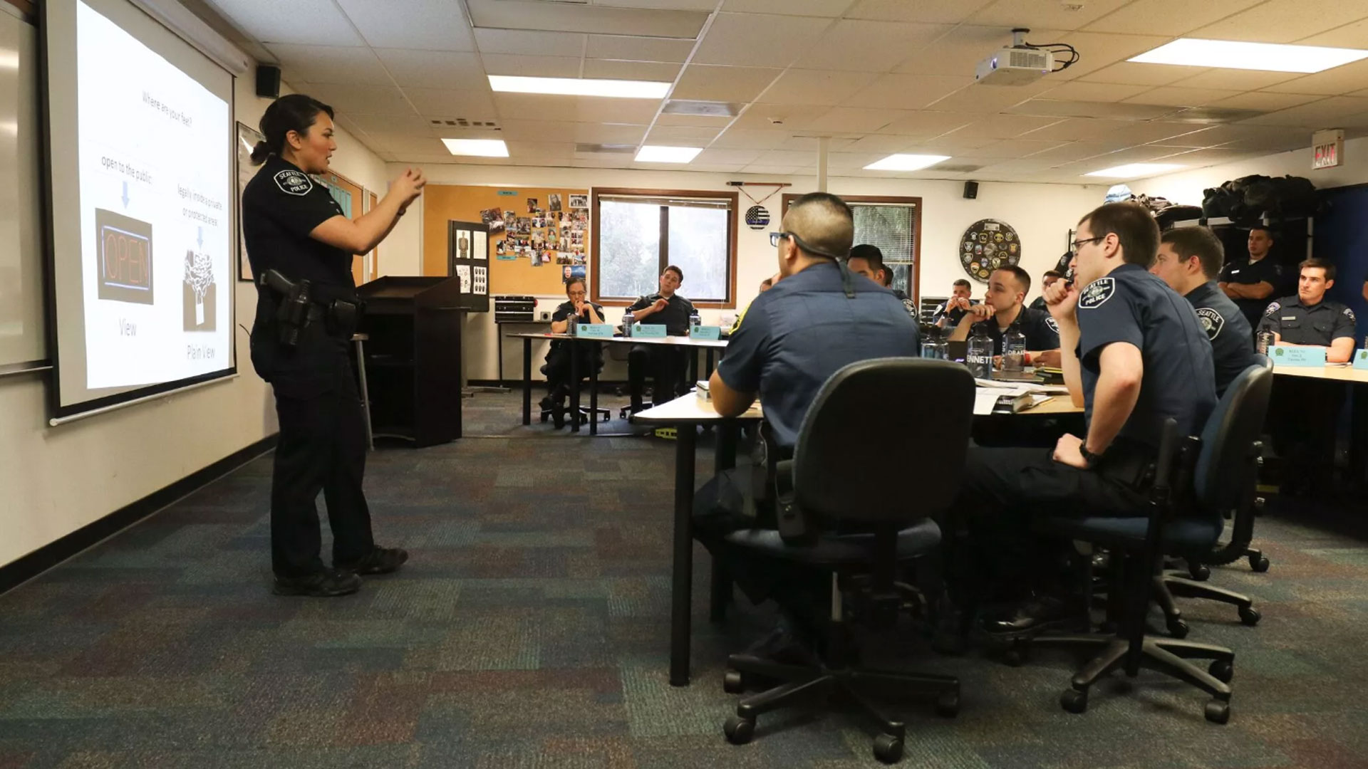 Officer Jenifer Eshrom teaches a class of police recruits